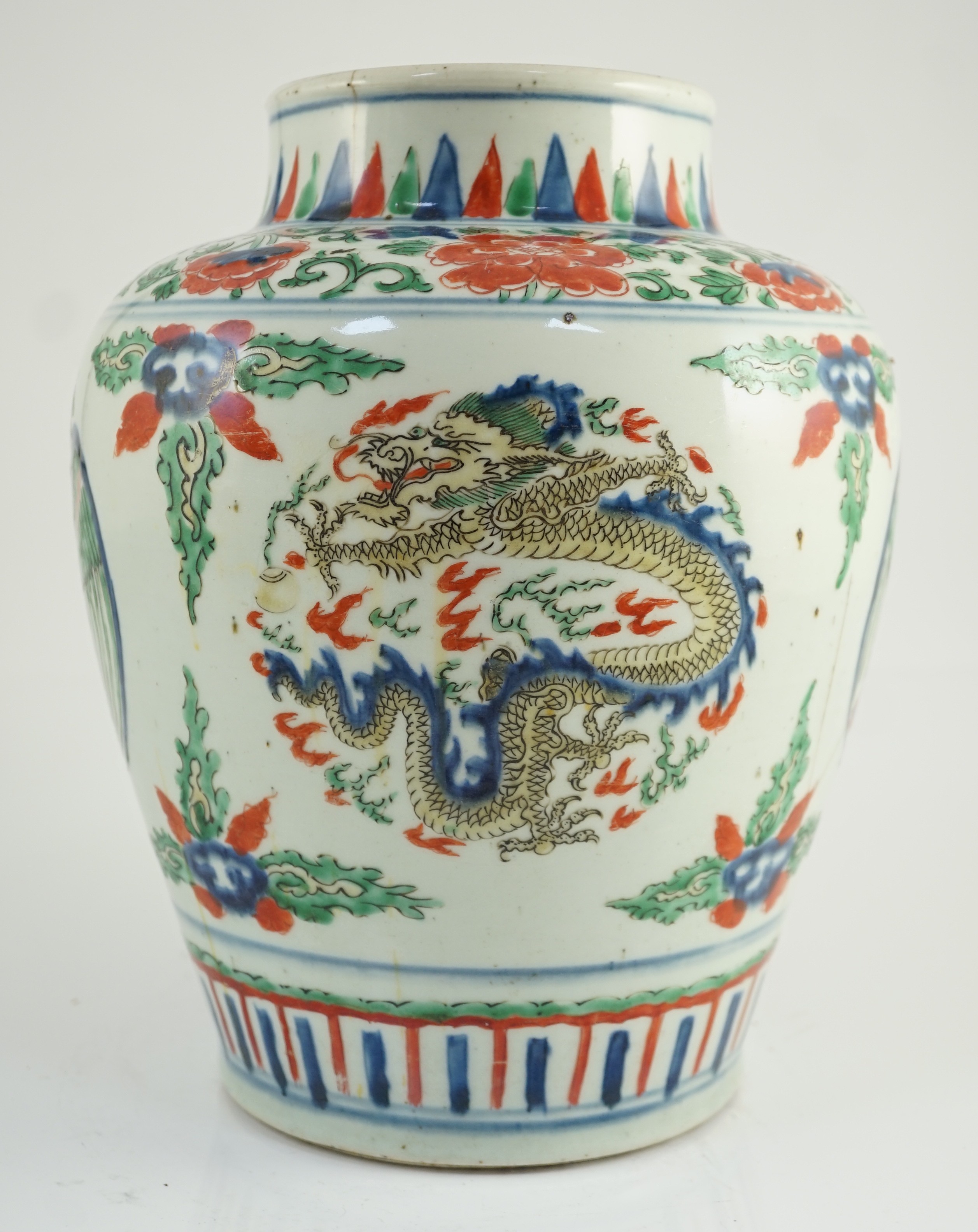 A Chinese Transitional wucai ‘dragon and phoenix roundel’ vase, 17th century, 30cm high, cracks